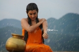 Archana latest Hot Wet in Rain Photos in Orange dress 25CineFrames