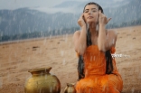 Archana latest Hot Wet in Rain Photos in Orange dress 25CineFrames