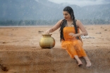 Archana latest Hot Wet in Rain Photos in Orange dress 25CineFrames