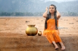 Archana latest Hot Wet in Rain Photos in Orange dress 25CineFrames