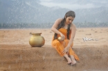 27-Archana-latest-Hot-Wet-in-Rain-Photos-in-Orange-dress