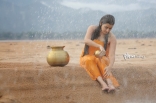 28-Archana-latest-Hot-Wet-in-Rain-Photos-in-Orange-dress