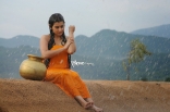 Archana latest Hot Wet in Rain Photos in Orange dress 25CineFrames