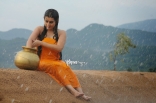 Archana latest Hot Wet in Rain Photos in Orange dress 25CineFrames