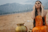 Archana latest Hot Wet in Rain Photos in Orange dress 25CineFrames