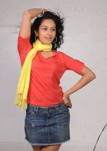 Rakul Preet Singh Photo Shoot Stills in Red T-Shirt and Shorts