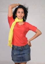 Rakul Preet Singh Photo Shoot Stills in Red T-Shirt and Shorts