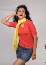 Rakul Preet Singh Photo Shoot Stills in Red T-Shirt and Shorts