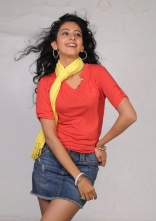 Rakul Preet Singh Photo Shoot Stills in Red T-Shirt and Shorts