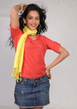Rakul Preet Singh Photo Shoot Stills in Red T-Shirt and Shorts