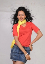 Rakul Preet Singh Photo Shoot Stills in Red T-Shirt and Shorts