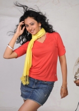 Rakul Preet Singh Photo Shoot Stills in Red T-Shirt and Shorts