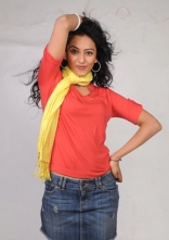 Rakul Preet Singh Photo Shoot Stills in Red T-Shirt and Shorts