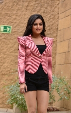 Mishti Chakraborty Latest Hot Stills in Red Top Black Skirt Photos