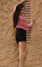 Mishti Chakraborty Latest Hot Stills in Red Top Black Skirt Photos