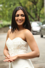 Catherine Tresa Latest HD Photos in White dress at Goutham Nanda teaser Launch Event