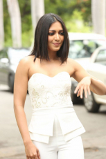 Catherine Tresa Latest HD Photos in White dress at Goutham Nanda teaser Launch Event