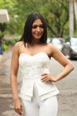 Catherine Tresa Latest HD Photos in White dress at Goutham Nanda teaser Launch Event