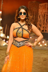 Surbhi Hot ULTRA HD Photos in Okka Kshanam Dillore Dillore Song | Surabhi Orange Dress Images Stills Gallery