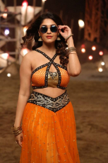 Surbhi Hot ULTRA HD Photos in Okka Kshanam Dillore Dillore Song | Surabhi Orange Dress Images Stills Gallery