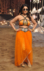 Surbhi Hot ULTRA HD Photos in Okka Kshanam Dillore Dillore Song | Surabhi Orange Dress Images Stills Gallery