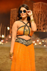 Surbhi Hot ULTRA HD Photos in Okka Kshanam Dillore Dillore Song | Surabhi Orange Dress Images Stills Gallery