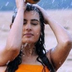 Archana latest Hot Wet in Rain HD Photos in Orange dress