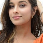 Actress Madhurima Cute in Orange Dress Photos